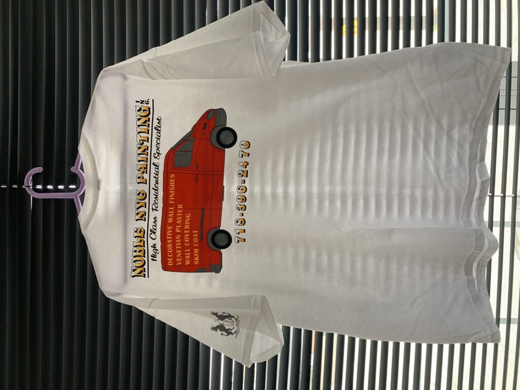 White t-shirt printed with a painting company logo and branding