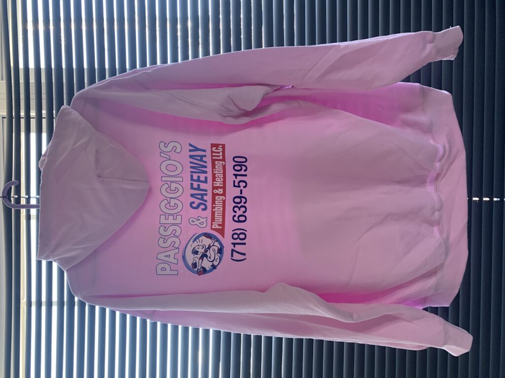 Branded pink hoodie featuring a plumbing business logo print